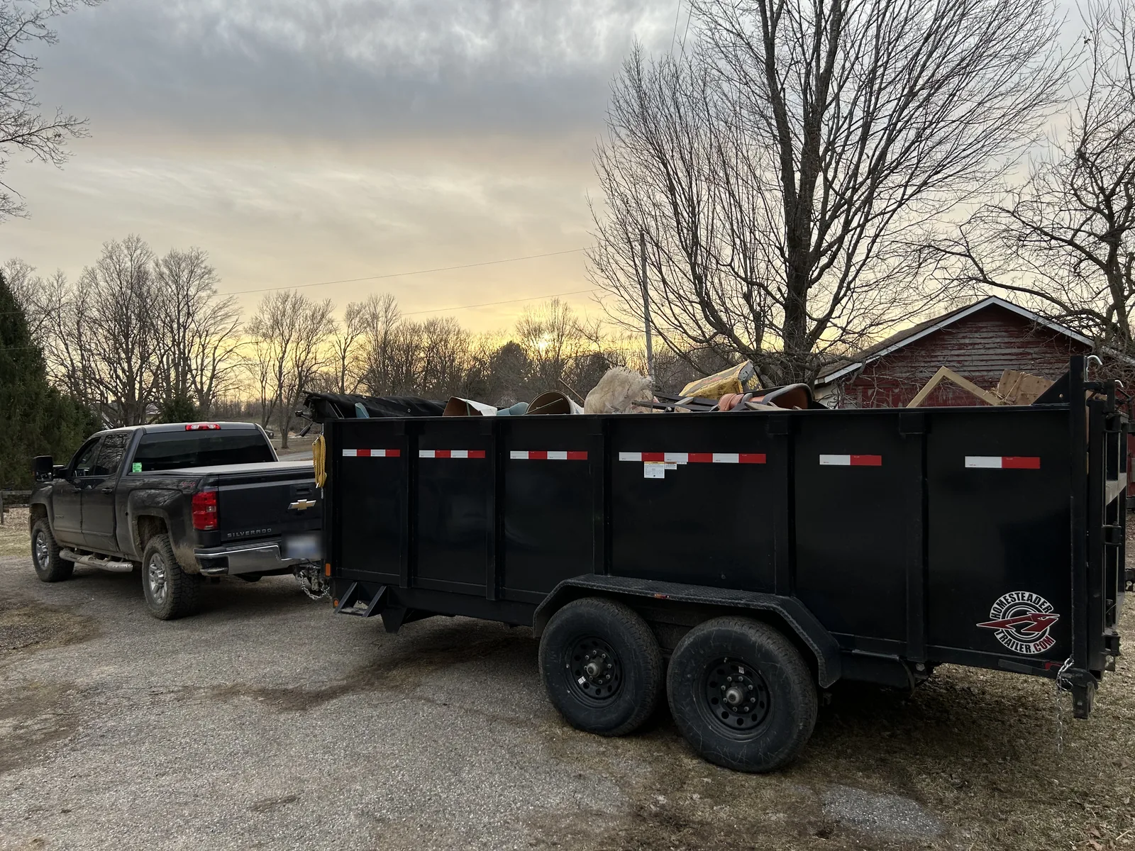 Truck and loaded dump trailer on a job in Southwest Michigan
